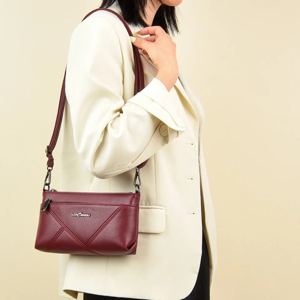 aline™ – elegant crossbody skulderveske