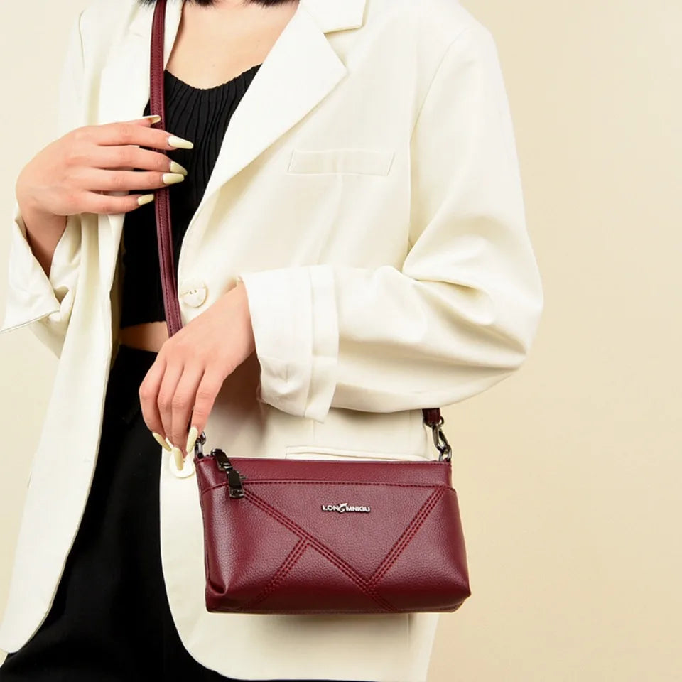aline™ – elegant crossbody skulderveske