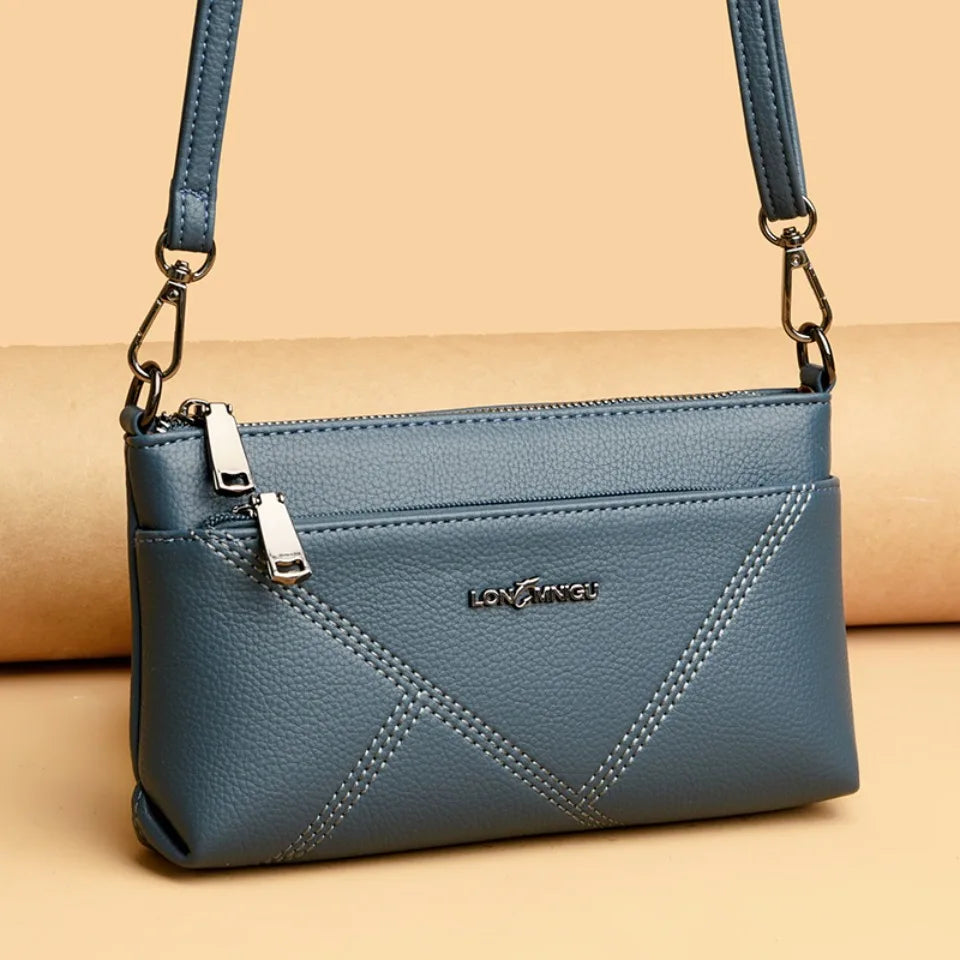 aline™ – elegant crossbody skulderveske