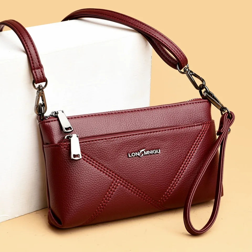 aline™ – elegant crossbody skulderveske