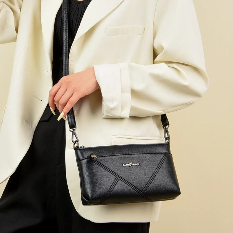 aline™ – elegant crossbody skulderveske