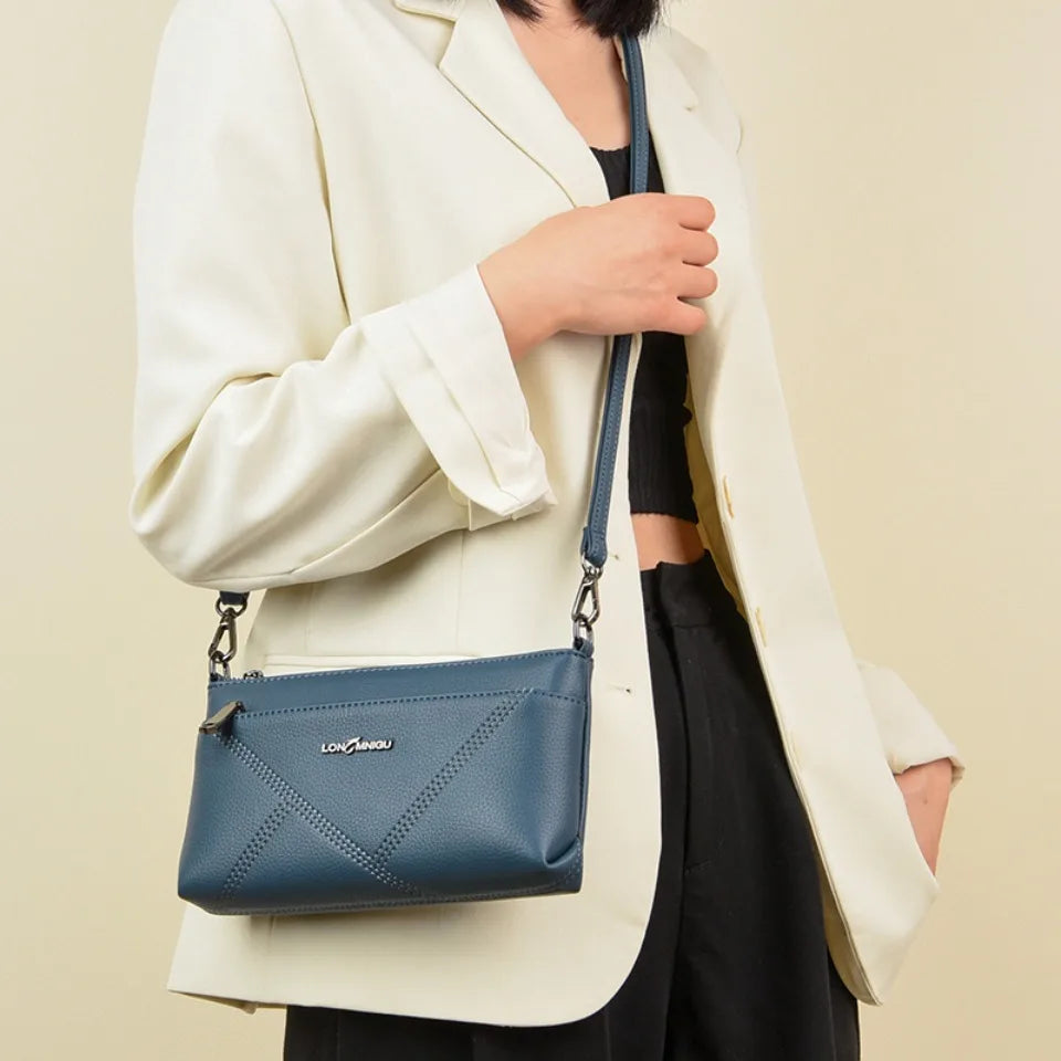aline™ – elegant crossbody skulderveske