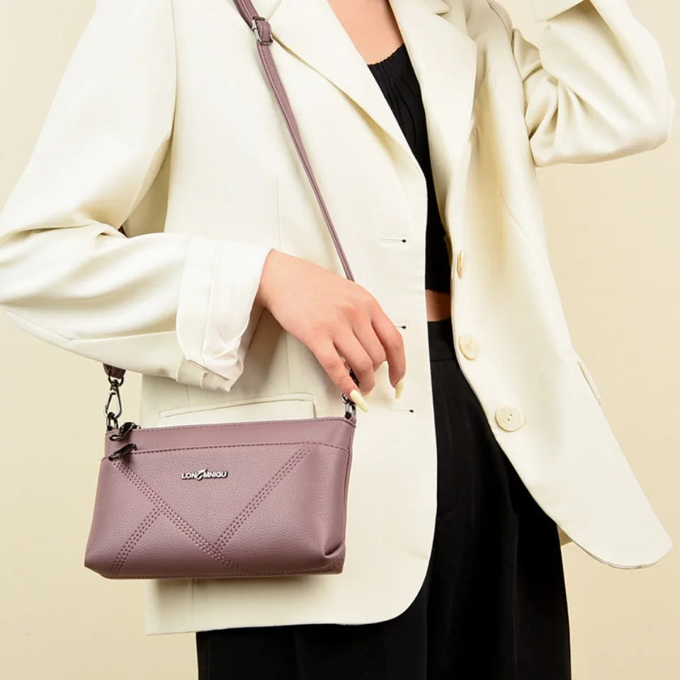 aline™ – elegant crossbody skulderveske
