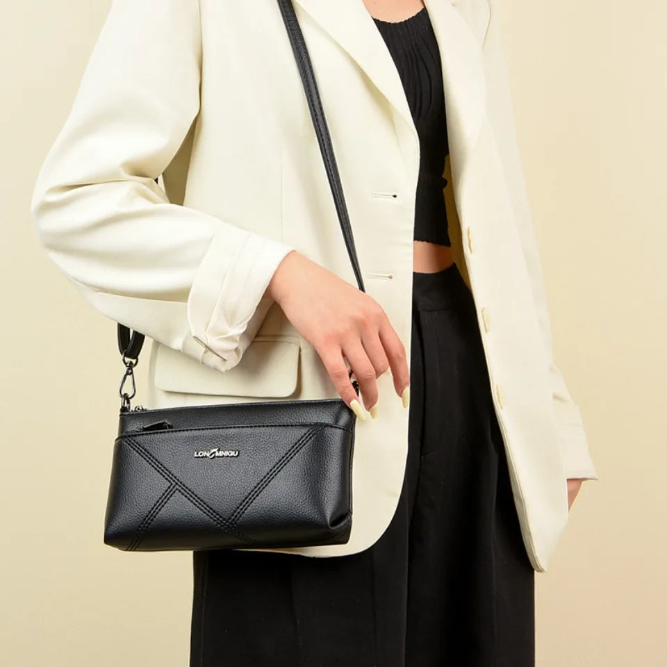 aline™ – elegant crossbody skulderveske