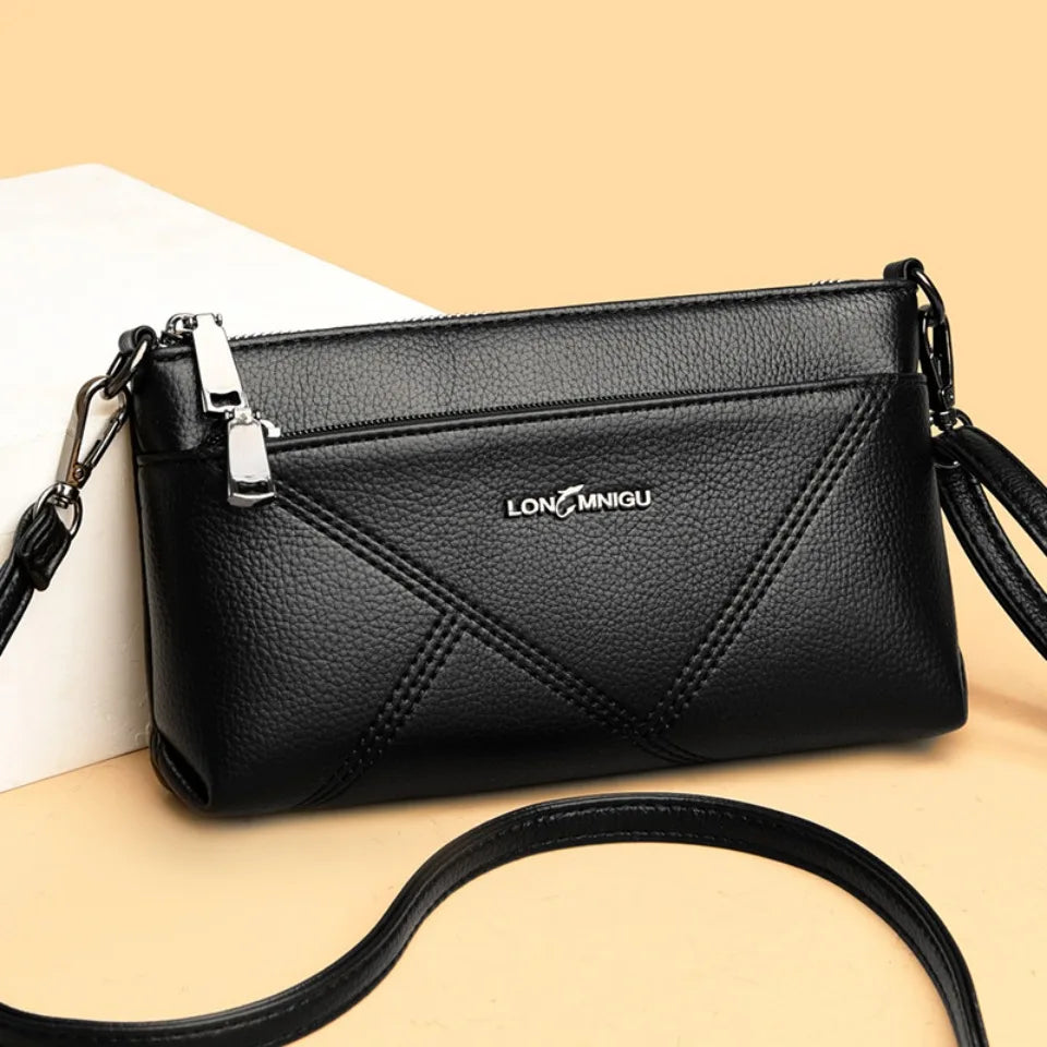 aline™ – elegant crossbody skulderveske